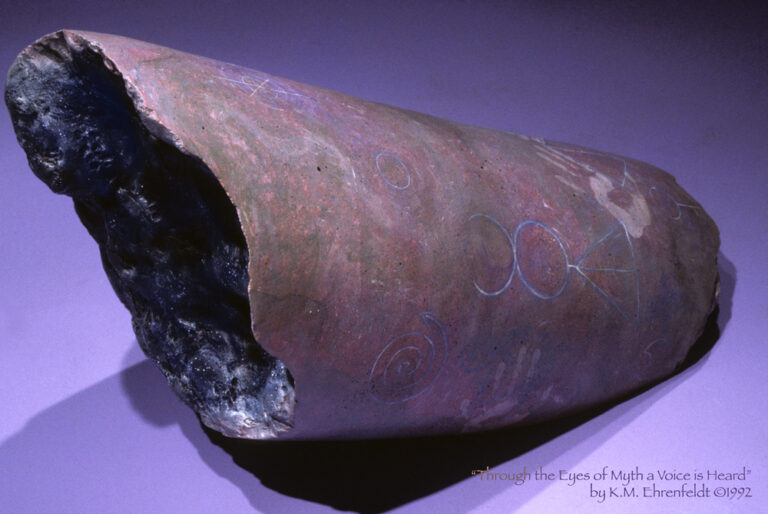In a blue-violet space, the view of this painted broken-column, laying at an angle on the ground, reveals the undulating night sky quality of the interior of the Core Sample's nature. The outer surface of the Core Sample is smooth, with transparent washes of grays, magenta, violet, and blue hues over a foundation that appears marble stone-like. In transparent effects, white and blue pigments form feminine symbols: a receptive spiral, a handprint, a geometric symbol of Astarte goddess of creation, and a crescent moon. More symbols are apparent on the rest of the surface, though less visible.