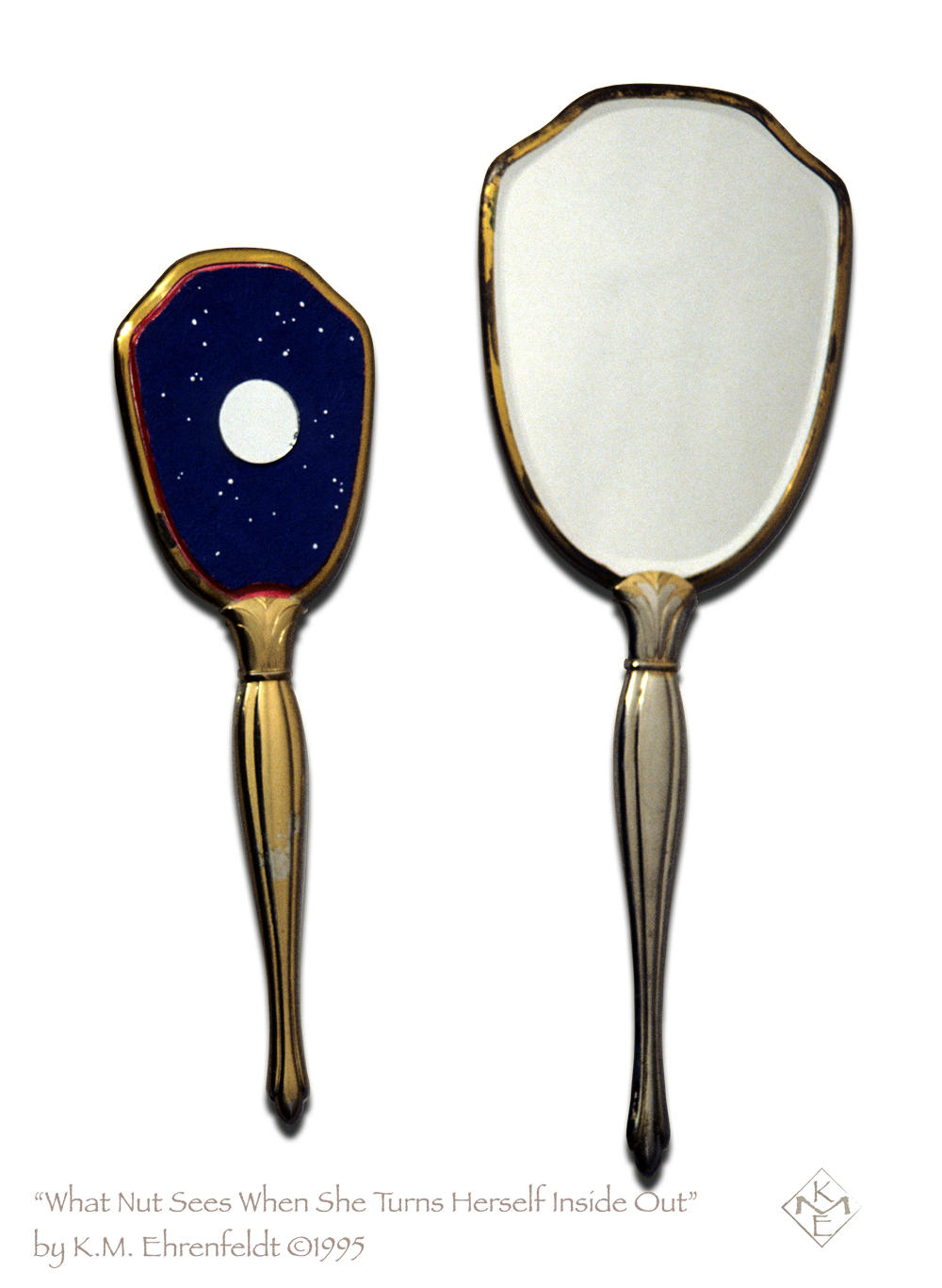 An antique long-handled mirror set is shown side by side, mounted flat, with the mirrored sides visible. The smaller oval shape on the left side has a one-inch diameter mirror in the center of a starry night sky filling the entire surface, that is edged in deep red. To the right, the entire surface is the original beveled mirror. The art nouveau style handles have worn gold-plating revealing the gray metal beneath, that has been exposed through years of use.
