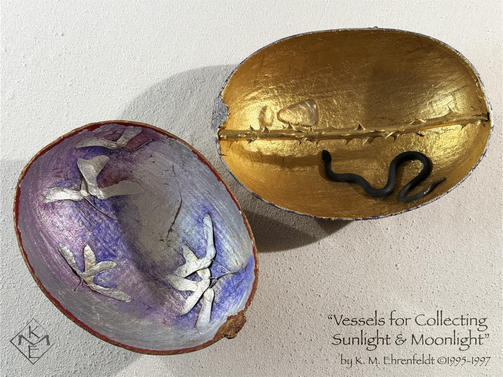 The Sun Vessel in full view in the upper right half of the image and the Moon Vessel in full view at the lower left. Sun vessel has a gold-leafed interior with a thorny gold-leafed rose stem bisecting the gourd lengthwise across the top from stem to base. A black snake enters from the lower left curving across the bottom toward the center. On the opposite side of the thorny rod above, a clear glass triangle rests inside, pointing upward, and resembles a puddle of light. A raised bump is visible above the puddle of light. The rim of the vessel is a deep blue and silver. An interior view of the Moon Vessel reveals the concave silver surface having a translucent blue-violet wash in a few areas as well as a faint magenta wash at some of the upper edges. The rim is stained gold and vivid red. Interlaid inside the vessel are groupings of silver maple seed pods that look like outspread wings.